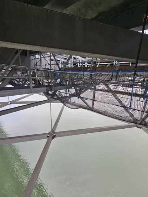 City buildings with rope access maintenance in progress