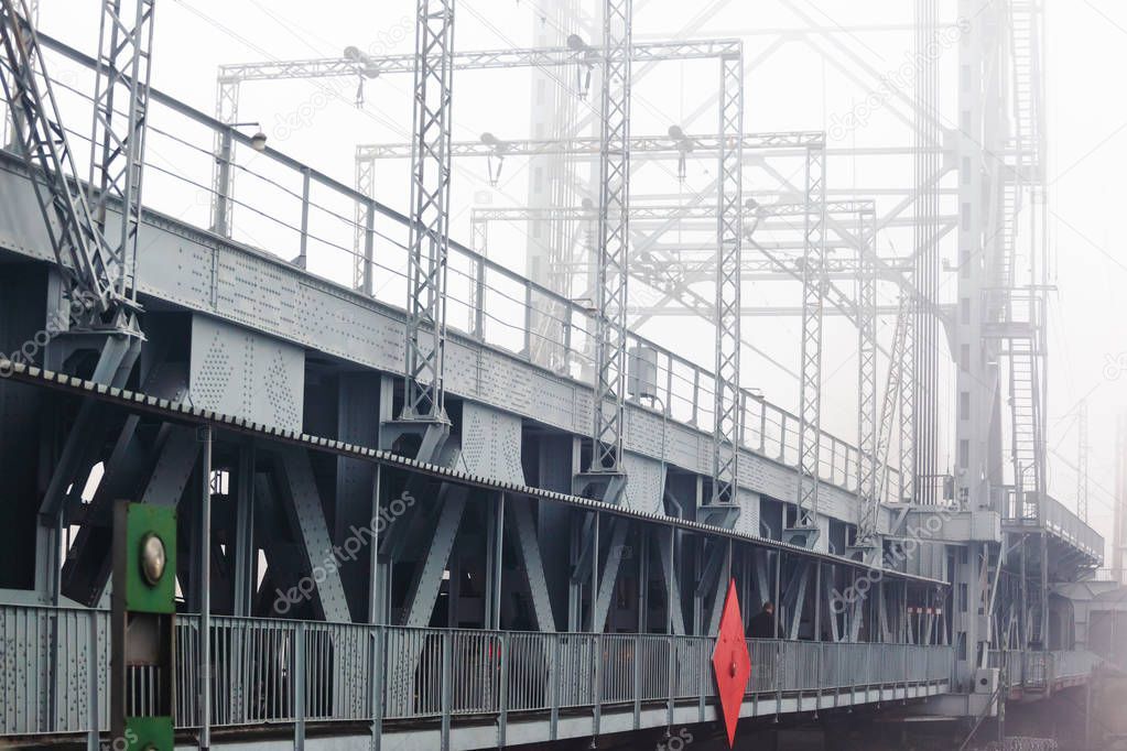 Engineer performing a structural inspection at height using rope access